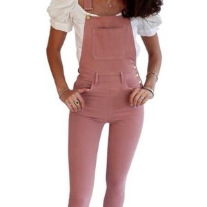 Denim overalls in dusty rose